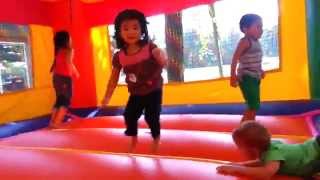 Kids Play in Inflatable Bounce House [upl. by Amolap]