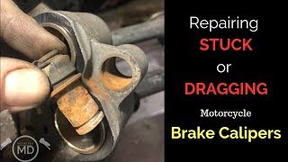 Repairing Stuck Brake Calipers Honda VT1100 [upl. by Ocirled962]