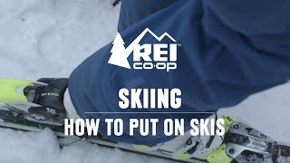 How to Put on Skis  REI [upl. by Tnahsin522]