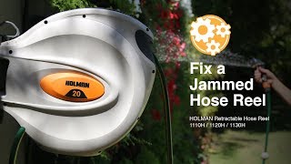 How to Fix a Jammed Holman Retractable Hose Reel [upl. by Aniret]