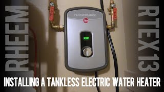 Installing a Tankless Electric Water Heater  Rheem RTEX 240v 13kw in My House [upl. by Aber696]