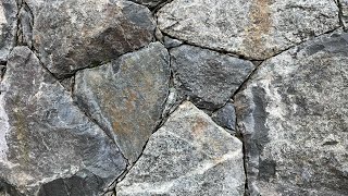 Secrets to creating a beautiful NATURAL STONE WALL Insights from a real stonemason [upl. by Eicart]