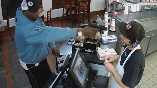 Watch Unfazed Cashier Keep His Cool During Terrifying Gunpoint Robbery [upl. by Starinsky]