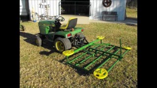 John Deere 332 with Homemade Harrow [upl. by Fanestil]