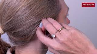 Adjust the volume for your BTE BehindtheEar hearing aid [upl. by Timmie]