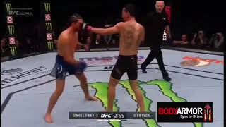 Max Holloway teaching Brian Ortega to block punches mid fight [upl. by Nallad]