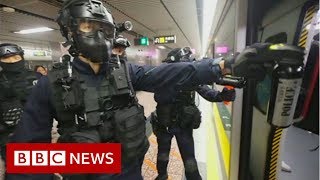 Hong Kong police storm metro system after protests  BBC News [upl. by Oinafipe]