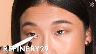 Waterline White Eyeliner Tutorial  Short Cuts  Refinery29 [upl. by Irtimd698]