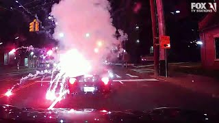 VIDEO Lit firework tossed into convertible by passing vehicle on July 4 [upl. by Aihtiekal]