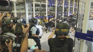 Live Protesters and police clash at Hong Kong airport  ITV News [upl. by Tabatha]